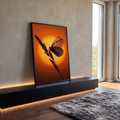 Quadro Decorativo Grande Borboleta ao Pôr do Sol para Sala | quadros decorativos para sala | borboleta em contraluz com asas transparentes sobre sol laranja intenso | em Quadros para Sala | Porao dos Quadros