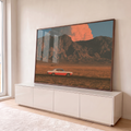 Quadro Decorativo Carro Clássico Vermelho na Estrada | quadros decorativos para sala | carro clássico vermelho e branco numa estrada com montanhas e nuvem alaranjada ao fundo | em Quadros para Sala | Porao dos Quadros