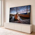 Quadro Decorativo Grande Barco de Madeira Cais para Sala | quadros decorativos para sala | barco de madeira ancorado num cais com corda náutica em primeiro plano ao entardecer | em Quadros para Sala | Porao dos Quadros