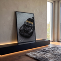 Porsche 911 RWB preto visto de cima sobre concreto cinza, faixa Rauh-Welt no para-brisa, quadro decorativo