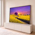 Quadro Decorativo Grande Campo com Árvore para Sala Amarelo | quadros decorativos para sala | campo amarelo de flores com árvore roxa e céu de pôr do sol vibrante | em Quadros para Sala | Porao dos Quadros