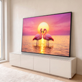 Dois flamingos rosa formando um coração diante do sol dourado refletido na água, quadro decorativo