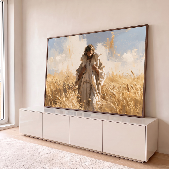 Quadro Decorativo Grande Jesus Bom Pastor Trigal para Sala | quadros decorativos para sala | homem de manto branco carregando cordeiro em campo de trigo dourado sob céu azul | em Quadros para Sala | Porao dos Quadros
