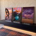 Quadro Decorativo Kit 3 Telas Paisagens de Viagem para Sala | quadros decorativos para sala | roda de bike refletida em salar, lagoa turquesa entre montanhas e vila de praia sob céu roxo | em Quadros para Sala | Porao dos Quadros