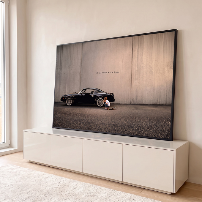 Quadro Decorativo Grande Carro Trans Am para Sala Preto | quadros decorativos para sala | menino agachado com skate observando roda de carro trans am preto | em Quadros para Sala | Porao dos Quadros