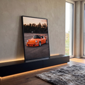 Quadro Decorativo Grande Carro Clássico para Sala | quadros decorativos para sala | carro esportivo laranja rebaixado com aerofólio ao pôr do sol | em Quadros para Sala | Porao dos Quadros