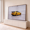 Quadro Decorativo Grande Carro Automóvel para Sala Amarelo | quadros decorativos para sala | carro esportivo amarelo visto de trás em estúdio branco com piso espelhado | em Quadros para Sala | Porao dos Quadros