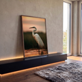 Quadro Decorativo Garça Branca ao Pôr do Sol na Água | quadros decorativos para sala | garça branca de pescoço curvado na água ao pôr do sol laranja | em Quadros para Sala | Porao dos Quadros