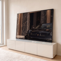 Quadro Decorativo Grande Filhote de Pantera para Sala Preto | quadros decorativos para sala | filhote de pantera negra apoiado no capô de um carro esportivo preto | em Quadros para Sala | Porao dos Quadros