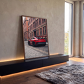 Quadro Decorativo Grande Carro de Pista para Sala | quadros decorativos para sala | carro esportivo vermelho com aerofólio preto em rua de paralelepípedos e prédio de tijolos | em Quadros para Sala | Porao dos Quadros