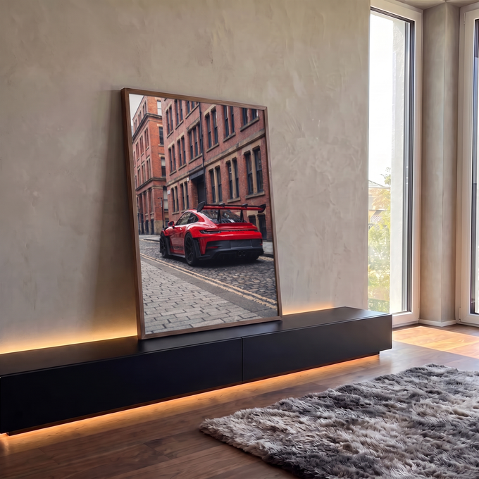 Quadro Decorativo Grande Carro de Pista para Sala | quadros decorativos para sala | carro esportivo vermelho com aerofólio preto em rua de paralelepípedos e prédio de tijolos | em Quadros para Sala | Porao dos Quadros