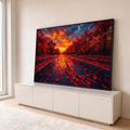 Quadro Decorativo Grande Estrada de Outono para Sala | quadros decorativos para sala | estrada coberta de folhas vermelhas entre árvores de outono sob céu alaranjado ao pôr do sol | em Quadros para Sala | Porao dos Quadros
