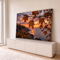 Folhas de bordo com gotas de chuva em contraluz e pôr do sol laranja sobre o mar, quadro decorativo