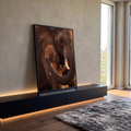 Quadro Decorativo Grande Elefante Jogando para Sala Marrom | quadros decorativos para sala | close de elefante com poeira subindo pela orelha e luz dourada de fim de tarde | em Quadros para Sala | Porao dos Quadros