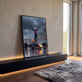 Quadro Decorativo Grande Piloto de Comemorando para Sala | quadros decorativos para sala | piloto comemorando em pé sobre carro de debaixo de chuva forte | em Quadros para Sala | Porao dos Quadros