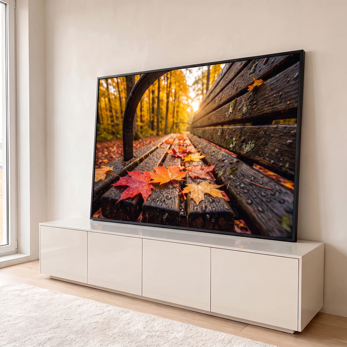 Quadro Decorativo Grande Banco de Madeira para Sala Laranja | quadros decorativos para sala | banco de madeira molhado com folhas coloridas de outono e floresta dourada ao fundo | em Quadros para Sala | Porao dos Quadros