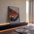 Porsche 911 clássico cobre metálico com faróis redondos sobre piso de concreto, quadro decorativo