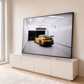 Quadro Decorativo Grande Carro Amarelo e Preto para Sala | quadros decorativos para sala | carro esportivo amarelo e preto visto de trás em garagem branca iluminada | em Quadros para Sala | Porao dos Quadros
