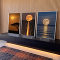 Quadro Decorativo Kit 3 Telas Três Fases para Sala Laranja | quadros decorativos para sala | três cenas da lua cheia sobre savana, penhasco com cachoeira e mar ao entardecer | em Quadros para Sala | Porao dos Quadros