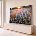 Quadro Decorativo Grande Campo de Flores para Sala Azul | quadros decorativos para sala | campo de flores azuis e laranjas com luz dourada do pôr do sol ao fundo | em Quadros para Sala | Porao dos Quadros