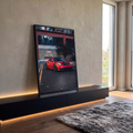 Porsche 911 GT3 RS vermelho em rua urbana com folhas de outono e prédio moderno, quadro decorativo