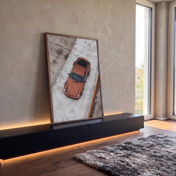 Porsche 911 clássico cor cobre fotografado de cima sobre piso de concreto cinza, quadro decorativo