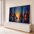 Quadro Decorativo Grande Veleiros em Canal para Sala Azul | quadros decorativos para sala | dois veleiros em canal urbano com luz dourada entre prédios azuis e vermelhos | em Quadros para Sala | Porao dos Quadros