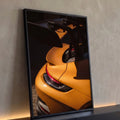 Quadro Decorativo Grande Detalhe de Carro para Sala Laranja | quadros decorativos para sala | detalhe traseiro de carro esportivo laranja com aerofólio preto e lanterna vermelha | Porao dos Quadros