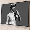 Quadro Decorativo Grande Estátua do David para Sala Cinza | quadros decorativos para sala | estátua clássica do David em preto e branco, torso e rosto em perfil | Porao dos Quadros
