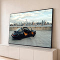 Porsche 911 Targa preto com interior caramelo e portas abertas diante do skyline de Nova York, quadro decorativo
