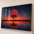 Quadro Decorativo Grande Lua Vermelha Árvore para Sala | quadros decorativos para sala | lua vermelha gigante atrás de árvore seca com gazelas refletidas em lago ao entardecer | Porao dos Quadros