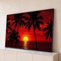 Quadro Decorativo Grande Pôr do Praia para Sala Vermelho | quadros decorativos para sala | silhuetas de palmeiras emoldurando pôr do sol dourado sobre o mar com céu vermelho | Porao dos Quadros