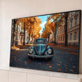 Fusca preto clássico de frente em rua com árvores de outono e folhas no chão, quadro decorativo