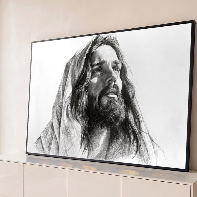Desenho a grafite de Jesus Cristo com manto e olhar elevado em preto e branco, quadro decorativo