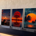 Quadro Decorativo Kit 3 Telas Lua Vermelha para Sala Laranja | quadros decorativos para sala | tríptico com dente-de-leão, lua vermelha sobre árvore e coqueiros ao entardecer | Porao dos Quadros