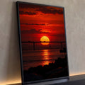 Quadro Decorativo Grande Pôr do Sol Ponte para Sala Vermelho | quadros decorativos para sala | pôr do sol vermelho e dourado atrás de ponte com reflexo no mar e pássaros voando | Porao dos Quadros