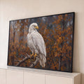 Quadro Decorativo Grande Águia Branca para Sala Branco | quadros decorativos para sala | águia branca de bico amarelo pousada em galho seco com folhagem outonal ao fundo | Porao dos Quadros