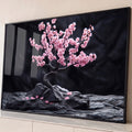 Bonsai de cerejeira com flores rosa sobre rochas negras e fundo preto, estilo japonês, quadro decorativo
