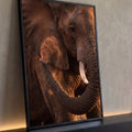 Quadro Decorativo Grande Elefante Jogando para Sala Marrom | quadros decorativos para sala | close de elefante com poeira subindo pela orelha e luz dourada de fim de tarde | Porao dos Quadros