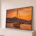 Quadro Decorativo Grande Veleiro Grego para Sala Laranja | quadros decorativos para sala | veleiro de madeira ancorado em baía grega ao pôr do sol com farol ao fundo | Porao dos Quadros