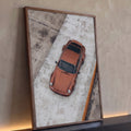 Porsche 911 clássico cor cobre fotografado de cima sobre piso de concreto cinza, quadro decorativo