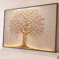Árvore da vida dourada com tronco trançado e folhas brancas em relevo sobre parede bege, quadro decorativo