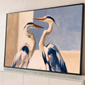 Quadro Decorativo Grande Duas Garças para Sala Azul | quadros decorativos para sala | duas garças brancas e azuis com bicos laranja entrelaçando os pescoços | Porao dos Quadros