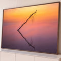 Quadro Decorativo Grande Galho Seco Laranja para Sala | quadros decorativos para sala | galho seco refletido em água parada sob céu de pôr do sol em laranja e rosa | Porao dos Quadros