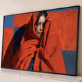 Quadro Decorativo Mulher com Xale Laranja em Fundo | quadros decorativos para sala | mulher envolta em xale laranja texturizado sobre fundo geométrico azul e laranja | Porao dos Quadros
