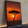 Acácia em silhueta diante do sol africano no céu laranja da savana, quadro decorativo