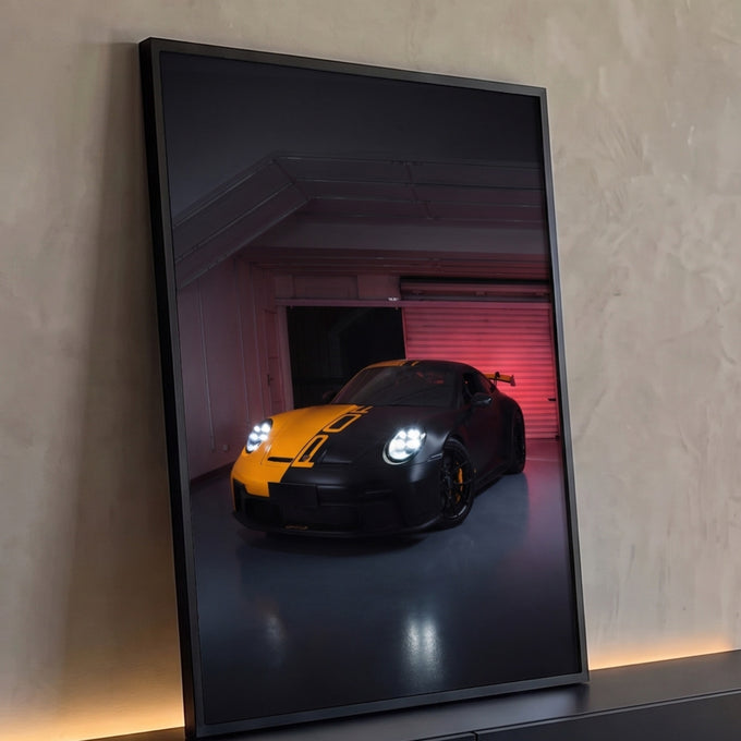 Quadro Decorativo Grande Carro e Amarelo para Sala Preto | quadros decorativos para sala | carro esportivo preto fosco com faixa laranja e faróis acesos em garagem escura | Porao dos Quadros