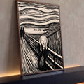 Quadro Decorativo Grande Grito de Edvard para Sala Preto | quadros decorativos para sala | figura gritando de mãos no rosto sobre ponte, ilustração preto e branco de linhas onduladas | Porao dos Quadros