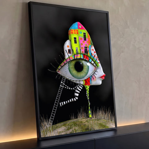 Rosto surreal em perfil com olho verde gigante, casas coloridas, escada e pernas listradas, quadro decorativo
