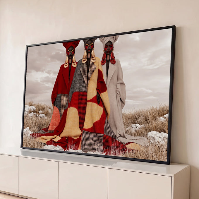 Três mulheres negras de turbante e casacos patchwork vermelhos em campo seco, quadro decorativo